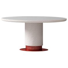 a white table with a red base on it