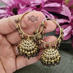 "Gorgeous, handcrafted gold & purple/brown polki jhumka baali! The earrings are 2.5 \" long & 1.25 \" wide. Picture is taken in natural room light. Please contact if you have any questions. Thanks! Color, shades, texture displayed may slightly vary from the actual product due to digital image limitations. We request you to consider these minor variations. Please expect the possibility of some slight imperfections when buying hand made jewelry. If you have any questions, please contact us." Natural Room, Polki Earrings, Hand Made Jewelry, Color Shades, Purple Gold, Digital Image, Beautiful Earrings, Jewelry Earrings Dangle, Pakistan