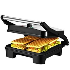 an electric sandwich maker with two sandwiches on it