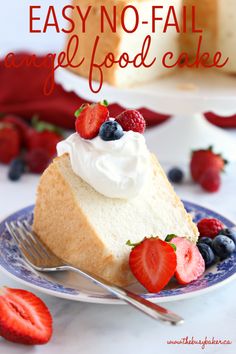 a slice of cake with whipped cream and berries on top is sitting on a plate