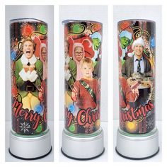 three christmas candles with pictures of people on them and the words merry christmas written in large letters