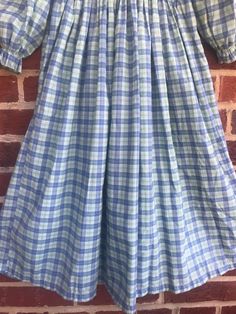 "Adorable prairie style dress so cute on/no sz tag or fabric labels/soft and cozy feels like a very lightweight flannel definitely has cotton or is all cotton/pit to pit 10 1/2\"-11\"Has some stretch /waist 10 1/2\"/pit to wrist 11\"/Elasticized wrists/length 34\"/Smoke free environment- adorable on throw on a pair of boots and you have a Little House on the Prairie!Color did not photograph well outside see last picture for more accurate color(34)" Vintage Style Smocked Dress For Spring, Spring Vintage Smocked Dress With Smocked Bodice, Prairie Ruffle Dress For Daywear, Prairie Daywear Dresses With Ruffles, Vintage Smocked Summer Dress, Prairie Style Ruffle Dresses For Daywear, Vintage Smocked Bodice Summer Dress, Prairie Style Ruffled Dresses For Daywear, Gingham Dresses With Smocked Bodice And Puff Sleeves