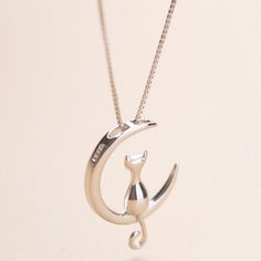 This Moon Cat Vintage Necklace will become your new little favorite jewel that you will enjoy to wear and it is just artfully conceived and made, with a cat that has realized her dreams of flying to the moon just one time and now she likes it so much, that she keeps dwelling and sitting there on the edge of the moon an Lucky Jewelry, Cat Moon, Cat Pendant Necklace, Cat Pendant, Moon Pendant Necklace, Cat Pendants, Cat Jewelry, Cat Necklace, Moon Pendant