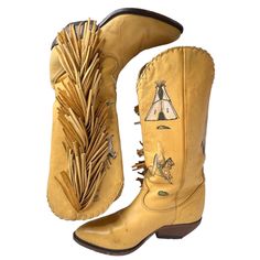 Rare Limited Edition Unique Hand Painted Vintage Zodiac Frontier Genuine Leatherwestern Southwestern Cowboy Boots Collectible Retro Size 6 Awesome Boots! Creamy Golden Tan Genuine Leather Uppers With Symbolic Western Designs. Thick Soft Lush Leather Fringe Top To Bottom Outer Leg Side Of Boot. Some Surface Wearvisible In Photos, None Of Which Effects The Boot Construction, Comfort, Wearability. These Boots Are Vintage. Shaft 12” Heel 4” Total Height 14” Tee Pee Native American Equestrian Chief Headress Horse Paint Pony Bow Arrow Chaps Leather Bohemian Boots For Rodeo, Bohemian Leather Boots For Rodeo, Leather Bohemian Boots For Western-themed Events, Cowboy Fringe, Western Designs, Vintage Zodiac, Tee Pee, Vintage Cowboy Boots, Bow Arrow