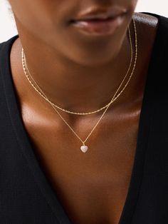 The twist every stack needs. This slim singapore chain necklace is plated in 14k gold and features a twisted, rope-like design. Made to catch the light, this necklace is bold enough to stand on its own but also adds something elevated to every stack. Whether you dress it up or tone it down with your favorite tee, this necklace is one you’ll reach for on the regular. Pair this chain with our Rope Pave ring for a look that’s full of texture. • Plated in 14k gold • Twisted, rope-like chain necklace • Water-resistant & tarnish-proof design Pave Ring, Anniversary Sale, The Light, Singapore, Chain Necklace, Water Resistant, Shop Now, Twist, Texture