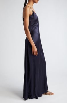 Effortless and elegant, this slipdress is expertly crafted in an ankle-skimming silhouette from bias-cut silk charmeuse. Slips on over head Scoop neck Spaghetti straps 100% silk Dry clean Made in Italy Designer Clothing Sleek Silk Maxi Slip Dress, Chic Silk Slip Dress For Night, Silk Slip Dress With Satin Finish For Daywear, Elegant Silk Dress For Daywear, Bias Cut, Chic Night Slip Dress With Bias Cut, Silk Satin Dress For Evening, Blue Satin Slip Dress With Bias Cut, Chic Silk Night Dress, Satin Slip Dress With Bias Cut For Night