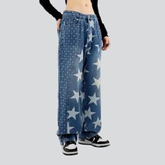 Go back to the days of Y2K modern with our 2023 Autumn Star & Ornament Print Slouchy Jeans a vibrant tribute to the millennium's legendary style!Why You'll Fall In Love: Y2K Vibe: Get ready to immerse yourself in the iconic Y2K vogue scene with these baggy jeans. a symbol of youthful exuberance and chic sophistication. High-Waisted Fit: The high-waisted fit ensures a perfect fit. ensuring you look confident and stylish all day long. Painted Prints: Intricately painted prints add a touch of artis Straight Leg Star Print Bottoms For Streetwear, Blue Wide Leg Jeans With Graphic Print, Denim Blue Jeans With Star Print For Streetwear, Star Print Denim Jeans For Streetwear, Y2k Modern, Iconic Y2k, Slouchy Jeans, Painted Jeans, Denim Patterns