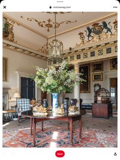 a living room filled with furniture and flowers