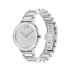 The Movado BOLD Evolution 2.0 is a modern design with a sharp look and elevated feel. 34mm stainless steel case Silver-tone dial with dazzling crystal pave and iconic dot motif Stainless steel bracelet with deployment clasp Modern White Gold Diamond Watch, Modern Diamond Watches With Round Shape, Modern Diamond Watches With Round Face, Modern Round Diamond Watch, Modern Silver Diamond Watch Accessories, Modern Stainless Steel Diamond Watch With Subdials, Modern Silver Watch Accessories With Diamond Hour Markers, Luxury Stainless Steel Analog Diamond Watch, Modern Watches With Diamond Hour Markers