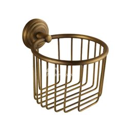 an antique brass toilet paper holder