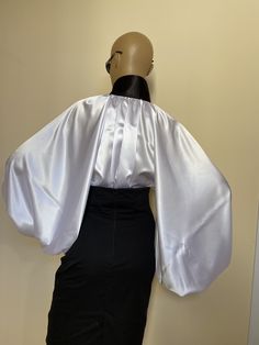 "This is a very stylish Womens Satin blouse. It is comfortable and cozy. Made for a free flowing fit. Black high collar and cuffs. Satin covered buttons Great for all year around and for any special occasion or casual day can be dressed up or dressed down. SIZE CHART SIZE S - US 6, UK 8, EU 36 bust: bust around 34.5\"/90cm Waist: waist around 27.5\"/70cm Hips: hips around 34.5\"/90cm SIZE M - US 8, UK 10, EU 38 bust: bust around 37.5\"/95cm Waist: waist around 29.5\"/75cm Hips: hips around 37.5\ Classic White Satin Blouse, Chic Satin Collared Blouse, Long Sleeve Satin Finish Top For Formal Occasions, Formal Long Sleeve Top With Satin Finish, Formal Long Sleeve Blouse With Satin Finish, Elegant Satin Collared Top, Fitted Silk Blouse With Cuffed Sleeves, Long Sleeve Tops With Satin Finish For Formal Occasions, Formal Blouse With Collar And Cuffed Sleeves