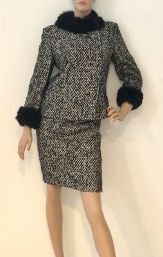 "Simply gorgeous vintage 1980s Devon Hall two piece suit, featuring a double breasted jacket with statement buttons closure, and a full, all around fur collar and cuffs; and a just above the knee length pencil skirt. Fabulous silhouette and drape. Unlined. Skirt has zipper and button closure. Round front buttons measure nearly 1 1/2\" in diameter. Approximate Measurements: Jacket: Chest: 38\"; Shoulder: 16.5\"; Length: 24\" Skirt: Waist: 28\"; Hips: 36\"; Length: 24\" No size label - likely a si Winter Party Tailored Skirt Suit, Tailored Skirt Suit For Winter Party, Classic Office Sets For Winter, Winter Formal Single-breasted Skirt Suit, Winter Workwear Sets With Buttons, Classic Winter Skirt Suit With Button Closure, Winter Classic Skirt Suit With Button Closure, Double-breasted Winter Evening Suits, Retro Tailored Long Sleeve Skirt Suit