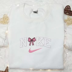 Coquette Pink Bow x Nike Embroidered Shirt & Hoodie: Perfect Gift for Girls Nike Inspired Cute Custom Nike Hoodies, Nike Sweatshirts Embroidery, Homemade Nike Sweatshirt, Nike Iron On Sweatshirt, Diy Nike Sweatshirt Iron On Patches, Nike Sweatshirts Diy, Cute Nike Hoodies, Nike Hoodie Aesthetic, Diy Nike Sweatshirt