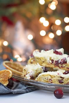 a close up of a plate of food with cranberry shortbreads on it