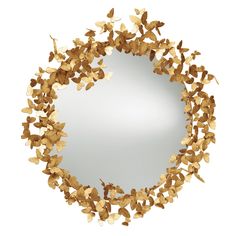 a mirror that has some gold leaves on it