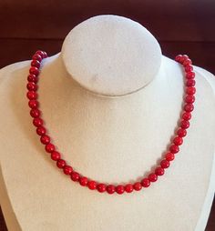 Red coral beaded necklace. This beautiful piece is very dynamic and simple can be worn on any occasion. Beads are 7mm Healing with Coral ♥ Absorbs negative energy ♥ Platonic love ♥ Friendship ♥ Community ♥ Creativity ♥ Passion ♥ Romantic love ♥ Wisdom ♥ Optimism ♥ Enthusiasm ♥ Balance ♥ Relaxation ♥ Protection ♥ Safe travel on water Coral represents diplomacy and concurrence. It quiets the emotions and brings peace to within the self. Facilitates intuition, imagination and visualisation. Coral e Elegant Red Coral Gemstone Beads, Elegant Red Coral Round Bead Necklaces, Elegant Red Coral Round Bead Necklace, Elegant Red Coral Beaded Necklace With Faceted Beads, Elegant Adjustable Red Coral Beaded Necklaces, Elegant Adjustable Red Coral Beaded Necklace, Red Coral Necklaces With Round Faceted Beads, Red Coral Necklace With Faceted Beads, Red Pearl Necklace With Gemstone Beads