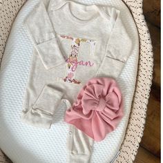 ✿ Welcome to our shop ✿ Our goal is to bring you the cutest and trendiest designs on the highest quality sweatshirts and shirts. All of our products are designed, embroidered printed, pressed, and shipped from our NJ studio. This adorable sleeper makes a perfect coming home outfit, newborn pictures, or baby shower gift. This features an ultra soft romper, with stitched name. Matching hat that will come with matching stitching. This outfit makes a perfect coming home outfit, newborn pictures, or Fall Cotton Onesie With Letter Print, Fall Cream Cotton Onesie, Cotton Long Sleeve Coming Home Outfit Set, Cotton Coming Home Outfit Set With Long Sleeves, Cute Personalized Cotton Onesie, Long Sleeve Onesie For Birthday, Pink Cotton Onesie With Name Print, Pink Cotton Onesie With Custom Print, Pink Cotton Onesie As A Gift