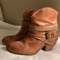 Ankle / Short Cowgirl Boots. Strap Detail Around Ankle. Genuine Leather. Corral Boots, Made In Mexico. Size 7 M Style Pb018. Indie Spirit Designs, Made Exclusively For Buckle. Edit: 8/28/23 These Boots Have Been Re-Heeled And Balanced. Brand New Heel Never Worn. Western Brown Booties With Reinforced Heel, Western Brown Booties With Stacked Heel, Western Style Brown Booties With Stacked Heel, Western Booties With Stacked Heel And Round Toe, Western Brown Ankle-high Booties, Western Ankle-high Booties With Stacked Heel, Brown Western Style Booties Medium Width, Chic Leather Boots For Ranch, Chic Leather Ranch Boots