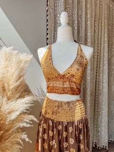 Choose bralette only, skirt only, or the two piece set~  BRALETTE DETAILS Gorgeous halter tie-back silk bralette in our stunning Desert Solstice© print! Perfect for a summer top, or fall layering.  S/M recommended for busts 30-34" L/XL recommended for busts 36-40" 2/3X recommended for busts 42-46"  SKIRT DETAILS Made from a beautiful lightweight silk blend fabric in our exclusive Desert Solstice© print. This airy, feminine skirt features multiple tiers for a flattering, flowy look + twirls that Fitted Skirt Set For Beach Summer, Fitted Cropped Beach Skirt, Cropped Fitted Beach Skirt, Fitted Cropped Skirt For The Beach, Bohemian Skirt For Summer Festivals, Summer Festival Bohemian Skirt, Bohemian Summer Festival Skirt, Bohemian Style Summer Festival Skirt, Two-piece Skirt Set For Summer Vacation