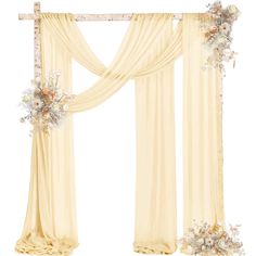 a white curtain with flowers on it and some curtains hanging from the side, in front of a white background