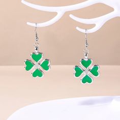 Lucky Clover Pendant Earrings 🍀 Elevate your style with these exquisite Enamel Four Leaf Clover Pendant Earrings for Women. Crafted with precision and adorned with vibrant enamel, these earrings are not just jewelry; they're a symbol of luck and beauty. The intricate clover design adds a touch of elegance to any outfit, whether you're dressing up for a special occasion or adding a dash of charm to your everyday look. Made with high-quality materials, these earrings are not only stunning but als Four Leaf Clover Keychain, 4 Leaf Clover Earrings, St Patrick’s Earrings, Irish Earrings, Four Leaf Clover Charm, Romantic Colors, Four Leaves, Lucky Clover, Four Leaf Clover