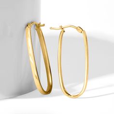 Ross-Simons - Italian 14kt Yellow Gold Flat-Oval Hoop Earrings. 1 1/4". Your versatile hoops just got a stylish upgrade! Our flat oval hoops from Italy shine in 14kt yellow gold. Hanging length is 1 1/4". Snap-bar, 14kt yellow gold oval hoop earrings. Minimalist Oval Hoop Earrings Tarnish Resistant, Minimalist Oval Tarnish Resistant Hoop Earrings, Minimalist Oval Hoop Earrings For Anniversary, Classic Oblong Hoop Earrings, Modern Oval 14k Gold Hoop Earrings, Minimalist Oval Hoop Earrings With Polished Finish, Modern 14k Gold Oval Hoop Earrings, Minimalist Oval Tarnish-resistant Hoop Earrings, Minimalist Tarnish-resistant Oval Hoop Earrings