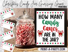 a jar filled with candy canes next to a sign that says how many candy canes are in the jar?