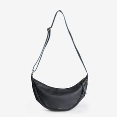 Leather Moon Sling Bag- Black - Redemption Market Minimalist Crossbody Hobo Bag With Adjustable Strap, Minimalist Crossbody Hobo Bag For On-the-go, Versatile Baguette Bag With Adjustable Strap For Everyday, Versatile Crossbody Baguette Bag For Everyday Use, Versatile Crossbody Hobo Bag With Adjustable Handle, Versatile Saddle Bag For Everyday Use, Versatile Baguette Bag Crossbody For Everyday Use, Minimalist Hobo Bag With Adjustable Strap For Everyday Use, Minimalist Hobo Bag With Adjustable Strap For Travel