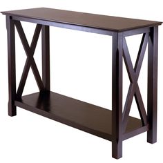 a wooden table with a shelf on the bottom and two shelves below it that are both dark brown