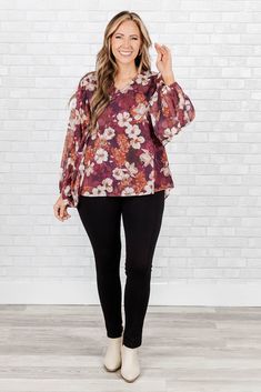 Elevate your wardrobe with this dazzling top in a beautiful wine color! It features a trendy floral pattern that is perfect for the season! The flowy fit is perfect for a brunch date or day in the office! Enhance your style and comfort with this versatile top! 100% Polyester Chic Flowy Blouse With Floral Print, Chic Burgundy Tops For Spring, Versatile Floral Print Tops For Day Out, Purple Floral Print Tops For Brunch, Chic Floral Print Blouse For Fall, Chic Floral Print Blouse For Brunch, Chic Floral Print Tops For Fall, Feminine Floral Print Tops For Fall, Elegant Floral Print Top For Day Out