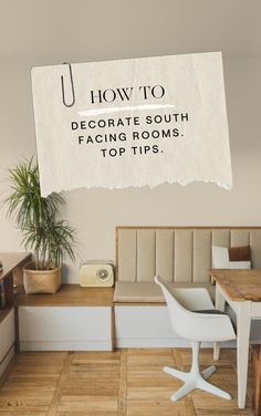 a sign that says how to decorate south facing rooms top tips on a wall above a desk