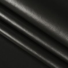 black leather textured up close to the surface