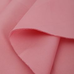 closeup of pink fabric with very soft folds