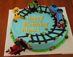 a birthday cake with a train on it