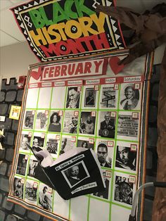 a black history month bulletin board with pictures on it