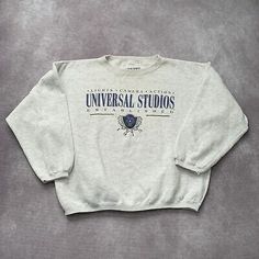 Vintage 90s Universal Studios Sweatshirt Size M Gray Hollywood Camera Orlando  | eBay 90s Style Cotton Sweatshirt For Fall, 90s Style Crew Neck Top For Fall, 90s Style Relaxed Fit Sweatshirt For College, 90s Letter Print Sweater For Fall, 90s Cotton Sweatshirt For Fall, 90s Style Sweater For College In Winter, 90s Crew Neck Top For Winter, 90s Style Streetwear Tops With Ribbed Cuffs, 90s Style Ribbed Cuffs Tops For Streetwear