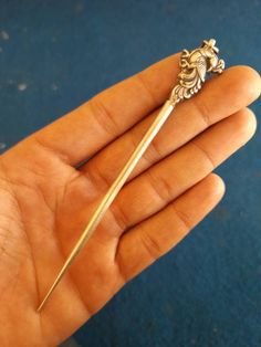 "product- This beautiful hairpin is made of sterling silver. The beautiful polish over it is done by oxidizing. this hairpin is specially designed for girls to match their every outfit. You can match this hairpin with every type of outfit. This hairpin is a theme-based unit of royalty. metal-  The metal we have used to make this is \"sterling silver\" which means that the purity of silver insides is more than 92.5%. why wear silver-  As a metal, silver has significant health benefits that have been used across cultures for centuries. Silver has a proven track record as a powerful antimicrobial agent fighting infection and aiding in cold and flu prevention wound healing, and more. Silver also helps with internal heat regulation and circulation.   this product is made with guaranteed sterlin Bun Stick, Silver Hair Accessories, Bun Holder, Handmade Hair Accessories, Wound Healing, Silver Hair, Hair Accessories For Women, Accessories For Women, Beautiful Earrings