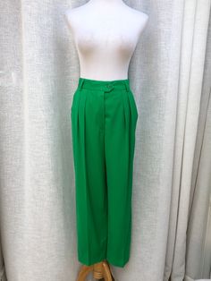 "For sale is a beautiful pair of Escada by Margaretha Ley bright green wool high waisted pants with front pleats, Made in Western Germany, size 38. Perfect condition! Measurements (flat): Waist: 27\" Hips: 36 Inseam: 25\" Overall Length: 37.5\" Rise: 13\"" Green Wide-leg Pants For Formal Occasions, Formal Green Wide-leg Bottoms, Green Wide Leg Formal Bottoms, Fitted Green Pleated Bottoms, Formal Green Wide Leg Bottoms, Green High-waisted Wide Leg Work Pants, Green High-waisted Pants For Workwear, Green High-waisted Pants For Work, Green High Waist Wide Leg Pants For Work