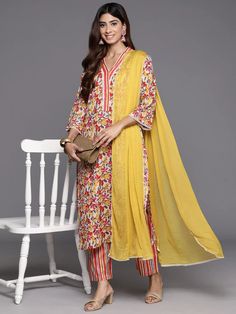 Grab this beautiful 3-piece set. The set comes with floral print & embroidered kurta has v neck, 3/4th sleeves & calf length teamed with printed trouser pant and a dupatta. Color - Multi Color Kurta Fabric-Cotton Bottom Fabric-Cotton Dupatta Fabric - Cotton Neck-V Neck Sleeves-3/4th Puff Sleeves Work - Print & Embroidery Detailing Washing Instructions-Hand Wash DISCLAIMER - The color of the product may be differ due to screen settings of device. A misprint here and a color drop slip there is the Multicolor Embroidered Cotton Dupatta With Woven Motifs, Multicolor Floral Cotton Unstitched Suit, Cotton V-neck Kurta With Floral Print, Floral Print Cotton Unstitched Suit, Eid Floral Print V-neck Kurta, Formal Jewelry, Cotton Bottoms, Casual Party, Churidar