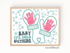 a card with two hands in mittens and the words baby it's cold outside