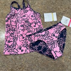 Size Medium (8-10y) New With Tags Color- Loop Floral Navy Pool Days Tankini Reversible Bikini Bottom Pink Racerback Stretch Swimwear, Pink Racerback Swimwear Stretch Fit, Pink Sports Swimwear, Pink Stretch Racerback Swimwear, Sporty Pink Tankini For Pool, Pink Sleeveless Tankini For Workout, Pink Tankini For Spring Playwear, Pink Sleeveless Tankini For Playwear, Pink Racerback Swimwear