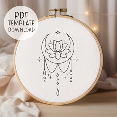 a cross stitch pattern with a lotus on it and the text, free templates included