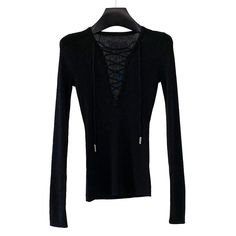 This is perfect for those who are looking for a clothing for a good price. It is fashionable, stylish, and it will look great on anyone who wears it. Do you wanahavit? Black Fine Knit Long Sleeve Top For Fall, Black Long Sleeve Fine Knit Top For Fall, Winter Layering V-neck Long Sleeve Top, Black Fine Knit Long Sleeve Top For Winter, Knitting Sweaters For Women, Knitting Sweaters, Casual Pullover Sweater, Casual Pullover, Cross Straps