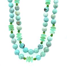 Beautiful greenish blue turquoise is paired with bright chrome diopside and elegant chrysoprase in this pretty necklace that is perfect for all seasons! The 8mm round turquoise has lovely color and subtle veining that gives each bead its own character and beauty. Translucent chrysoprase in shades of tranquil blues and greens complement the softer colors of the turquoise, while bright emerald-hued chrome diopside accentuate the green tones and add eye-catching pops of color. 14k yellow gold accen Luxury Turquoise Necklace With Round Gemstone Beads, Luxury Turquoise Gemstone Beaded Necklaces, Luxury Turquoise Necklace With Round Beads, Luxury Round Beads Turquoise Gemstone Necklace, Luxury Turquoise Polished Beaded Necklaces, Luxury Beaded Blue Turquoise Necklace, Luxury Blue Beaded Necklaces With Large Beads, Luxury Gemstone Necklace With Round Beads, Luxury Round Gemstone Beaded Necklace