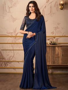 Pihu Satin Embroidered Work Designer Border Saree Premium quality fabric Enhanced with thread & tiki embroidery work. Comes with unstitch blouse fabric Turn up the glamour with the Pihu Saree! Made with luxurious satin and embellished with stunning embroidered tiki work, this designer border saree is sure to make a statement. Blue Sarees, Navy Blue Saree, Simple Saree Designs, Bollywood Dress, Plain Saree, Simple Sarees, Party Wear Lehenga, Blue Saree, Embellished Blouse