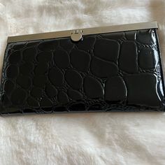 Black Patent Leather Wallet/Wristlet Black Wallet With Magnetic Closure, Chic Black Bifold Wallet, Elegant Rectangular Wallet As Fashion Accessory, Elegant Rectangular Fashion Wallet, Elegant Black Clutch With Snap Closure, Elegant Black Wallet, Chic Black Wallet For Daily Use, Elegant Black Clutch With Card Slots, Black Evening Clutch With Snap Closure