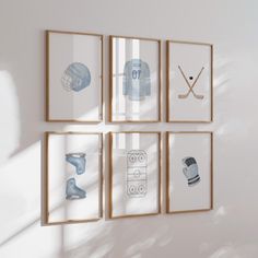 four framed photographs hang on the wall in front of a white wall with hockey memorabilia