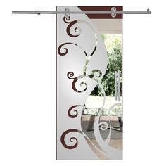 a glass door with swirl designs on it