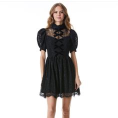 Product Details: Mini Length Dress Mock Neck Short Sleeve; Puff Sleeve Sheer Lace Back Button Back Closure Velvet Bows At Front Total Length: 34 3/4” 50% Viscose, 32% Nylon, 18% Cotton Dry Clean Only ~Waist: Approx. 14 Inches (Size 6) ~Bust: Approx. 16 Inches (Size 6) Imported $595 New To Poshmark? Sign Up Using The Code Limitedgems And Save $10 On Your Purchase Puff Sleeve Lace Party Dress, Lace Puff Sleeve Party Dress, Spring Evening Corset Dress With Short Sleeves, Chic Fitted Lace Dress With Puff Sleeves, Short Sleeve Cocktail Dress With Lace Trim, Cocktail Short Sleeve Dress With Lace Trim, Party Dress With Puff Sleeves And Lace Trim, Party Dress With Lace Trim And Puff Sleeves, Short Sleeve Mini Dress With Lace Trim For Evening