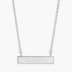 Commemorate a special memory with the Date Bar Necklace. This bar necklace will be custom engraved with your date of choice and is available in rose gold, yellow gold or rhodium-plated finishing options. A perfectly thoughtful gift for birthdays, anniversaries, and graduations. Available in 14k gold plated, rhodium plated or 14k rose gold plated brass Bar size: 1 1/4" by 1/4" 16" cable chain with 2" extender Lobster claw closure With engraving this item is FINAL SALE SKU: BYN1078 Sterling Silver Bar Necklace For Anniversary, Minimalist Sterling Silver Bar Necklace For Anniversary, Classic Silver Bar Necklace As A Gift, Silver Engraved Bar Necklace For Anniversary, Anniversary Engraved Silver Bar Necklace, Engraved Silver Bar Necklace For Anniversary, Elegant Personalized Silver Bar Necklace, Personalized Bar Necklace For Anniversary, Silver Custom Name Bar Necklace For Anniversary